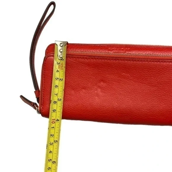 Coach orangy red leather double zipper wristlet clutch bag